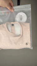 Bavoir imperméable à manches longues Création Jade - Rose doux