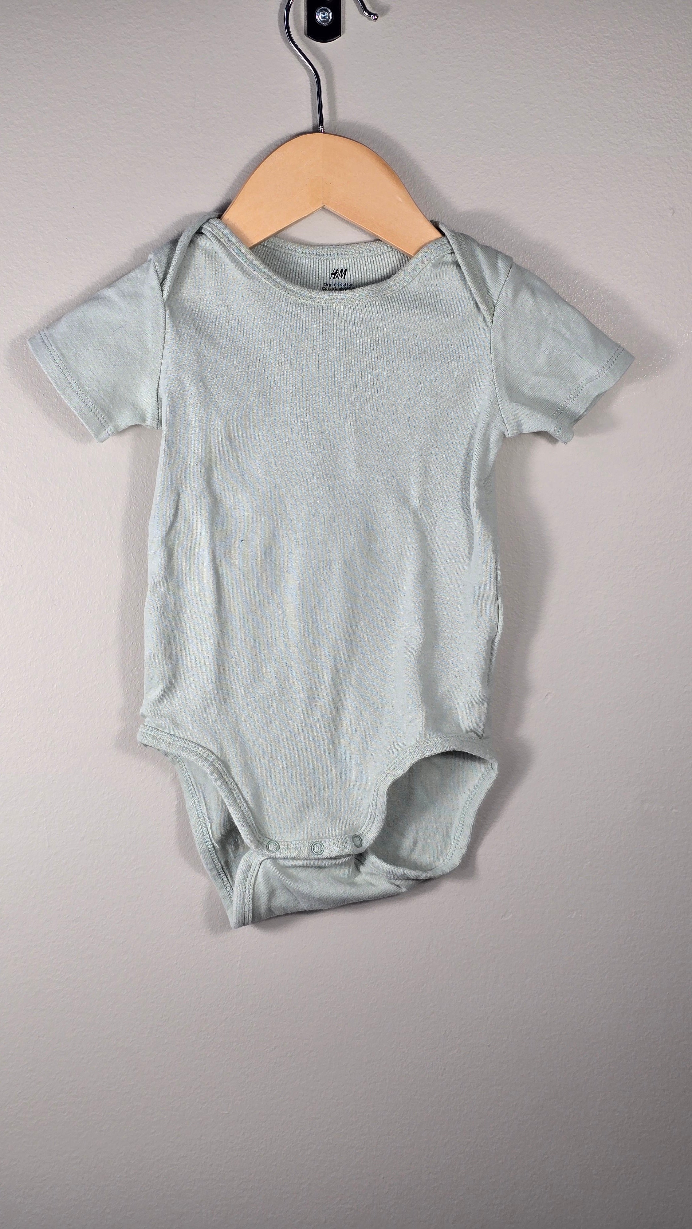 4-pack H&M bodysuits 12-18 months