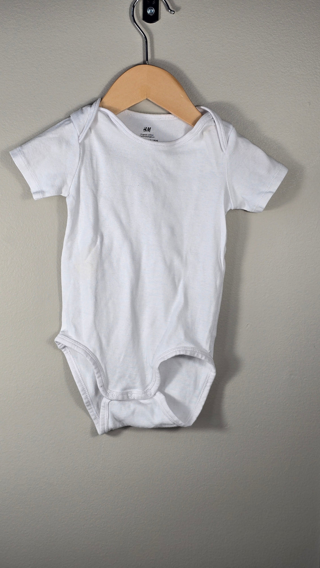 4-pack H&M bodysuits 12-18 months