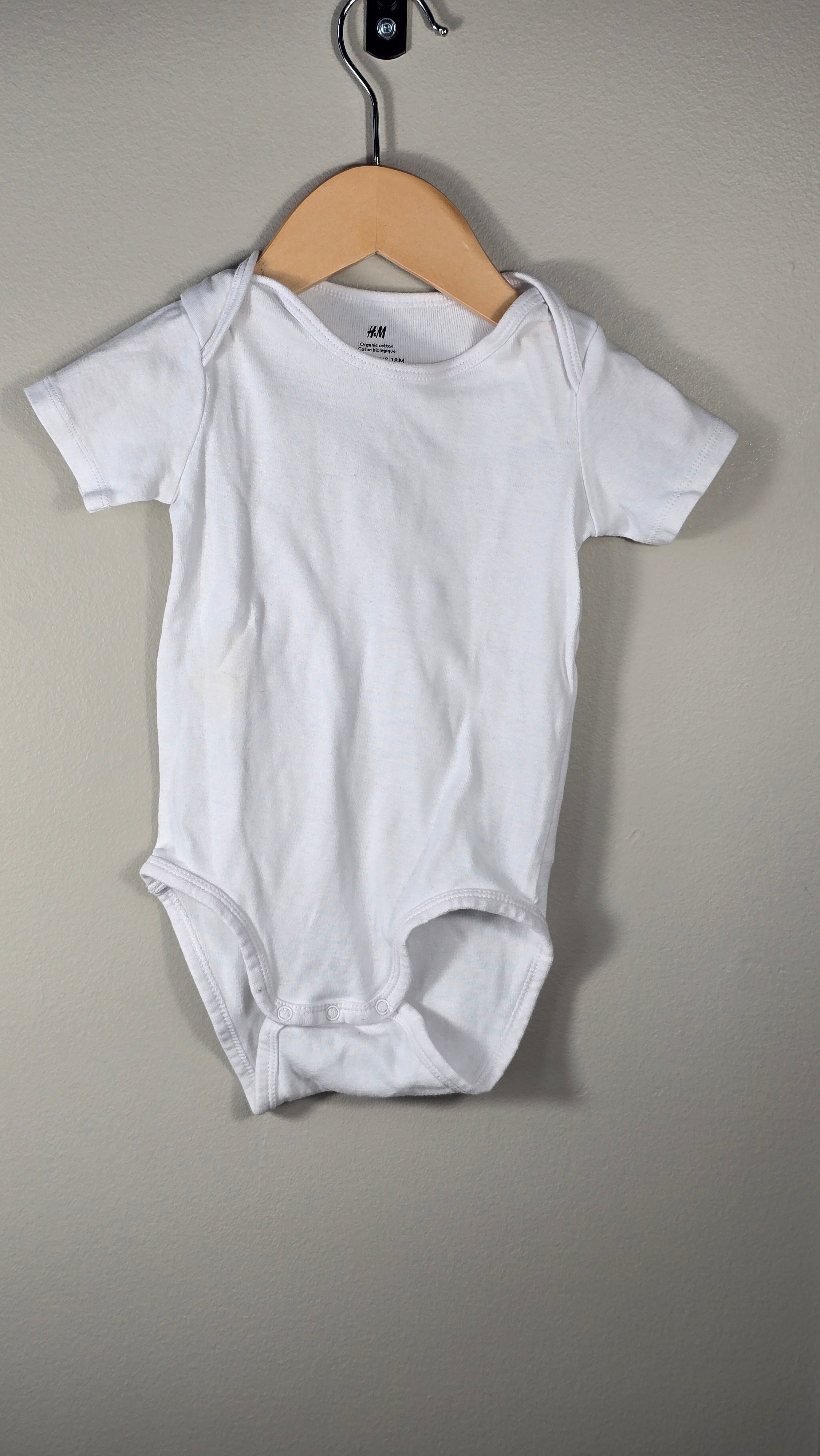 4-pack H&M bodysuits 12-18 months