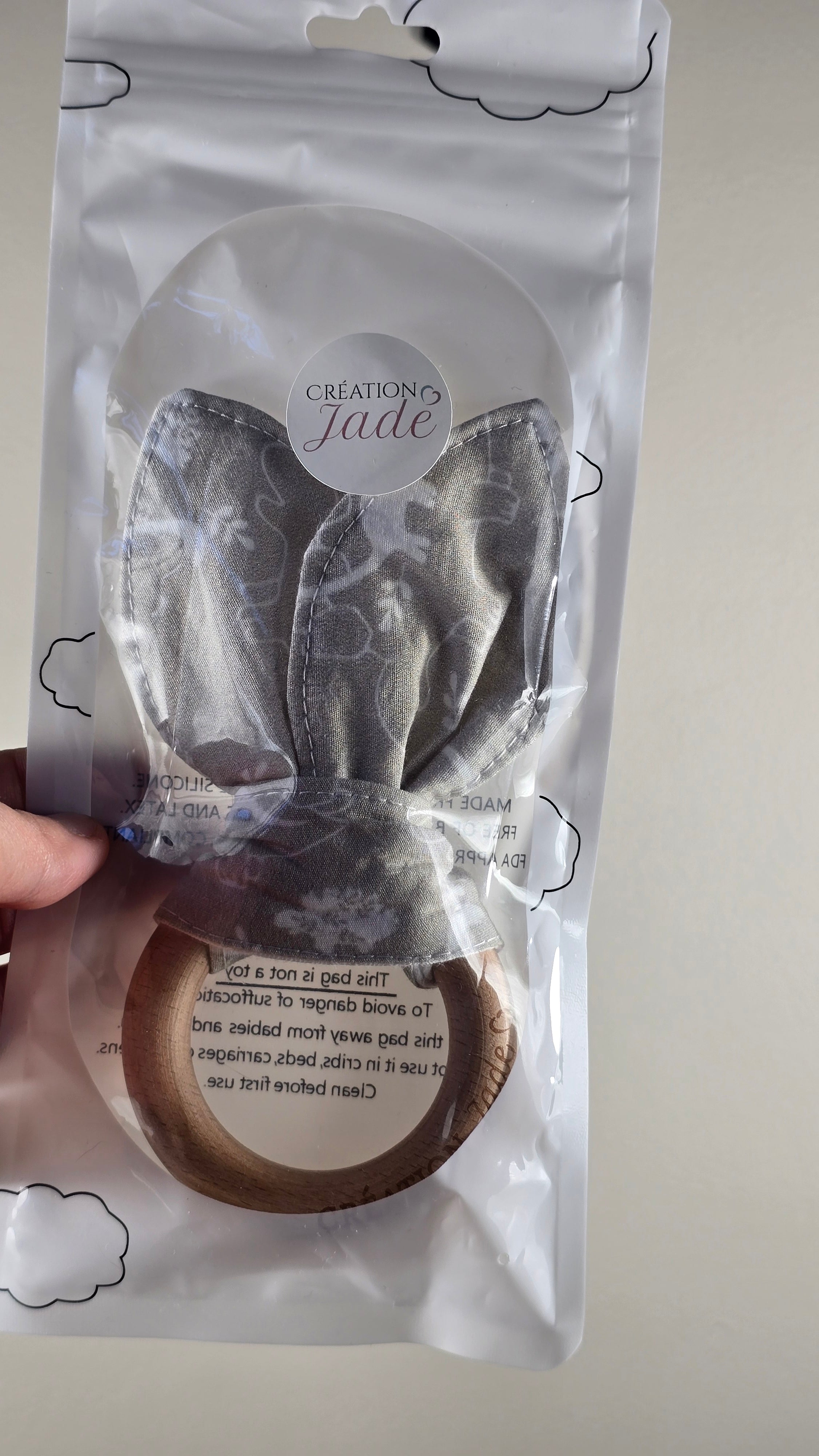 Jouet sensoriel pour bébé - Oreilles de lapin Création Jade - Dinosaures