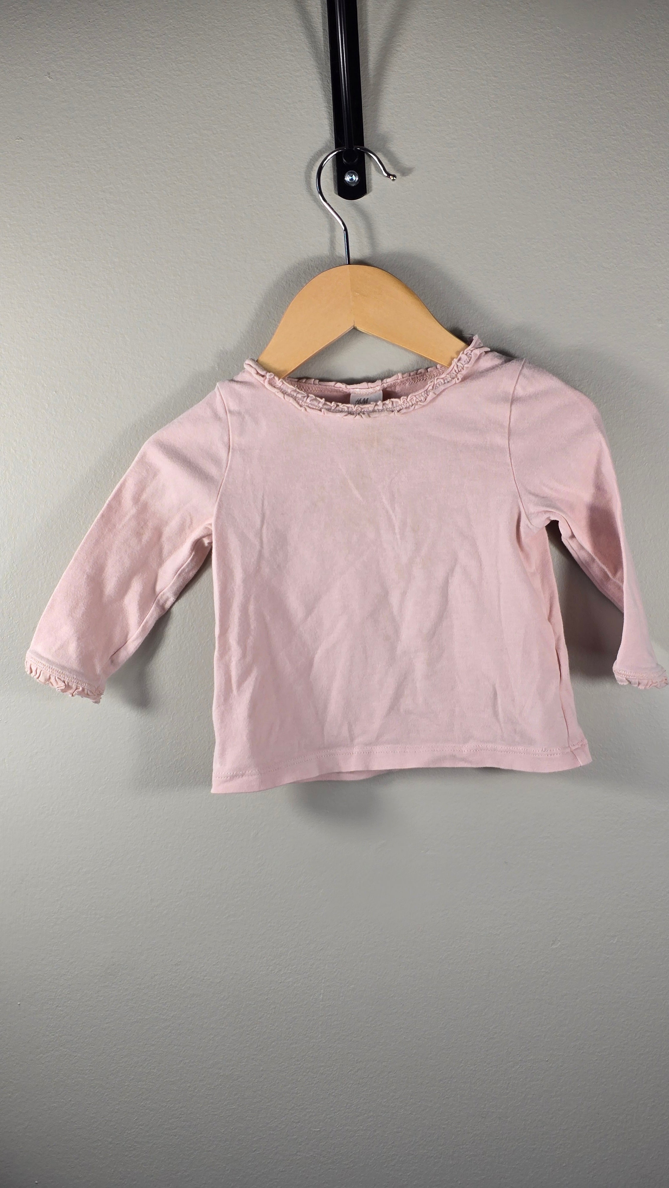 Chandail à manches longues avec froufrous au col | H&M | 6-9 mois