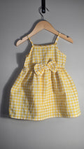 Robe à carreaux et boucle | Marque inconnue | estimée 12-18 mois *élastique à la taille
