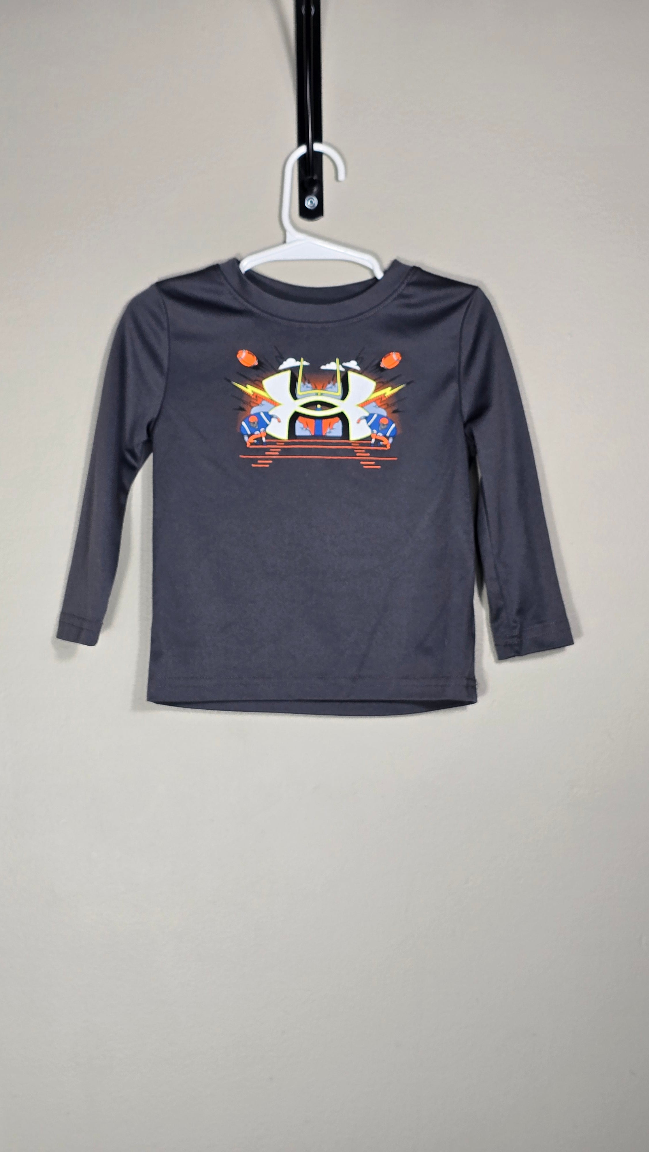 CONS CN 1 | Manche longue dry-fit | Under Armour | 18 mois *Dessin un peu craqué